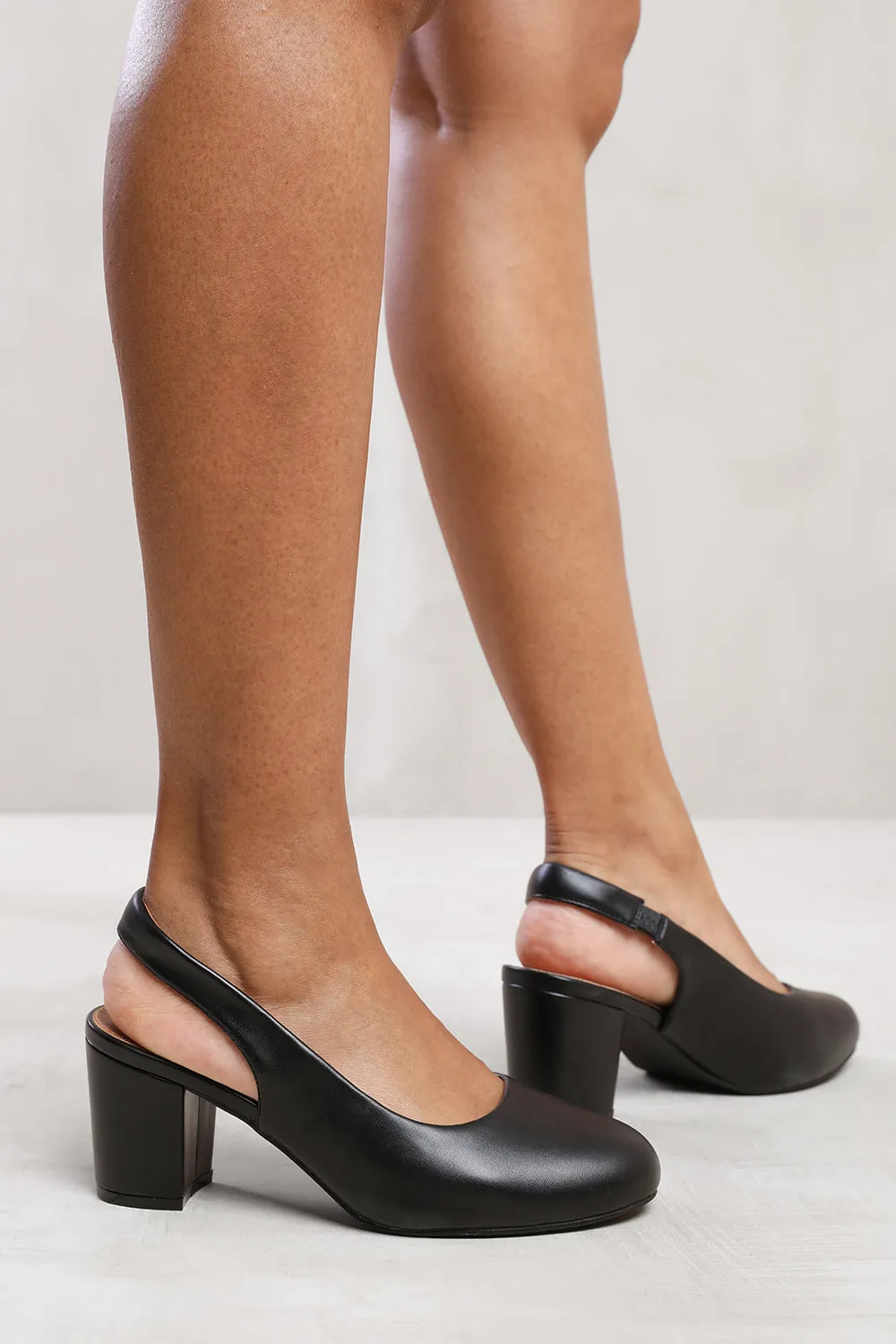 EDITH BLOCK HEEL SLINGBACK SHOES IN BLACK FAUX LEATHER