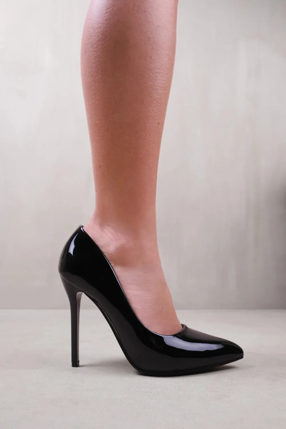 KYRA WIDE FIT HIGH HEEL STILETTO PUMPS IN BLACK PATENT FAUX LEATHER